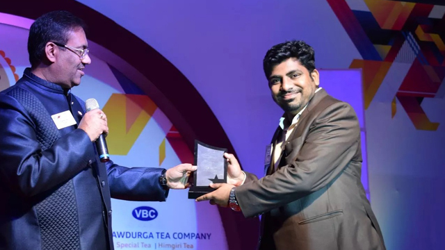 Vikram Sinha of We Care Pest Control receiving award of excellence Vikram Sinha of We Care Pest Control receiving award of excellence
