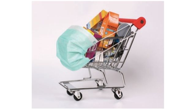 Shopping cart with mask New normal for in store environment