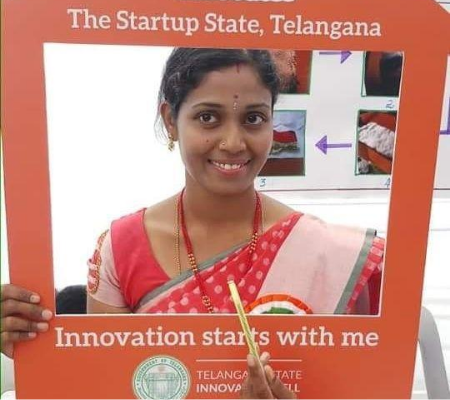 Haritha with her pencil with seed prototype Haritha with her pencil with seed prototype